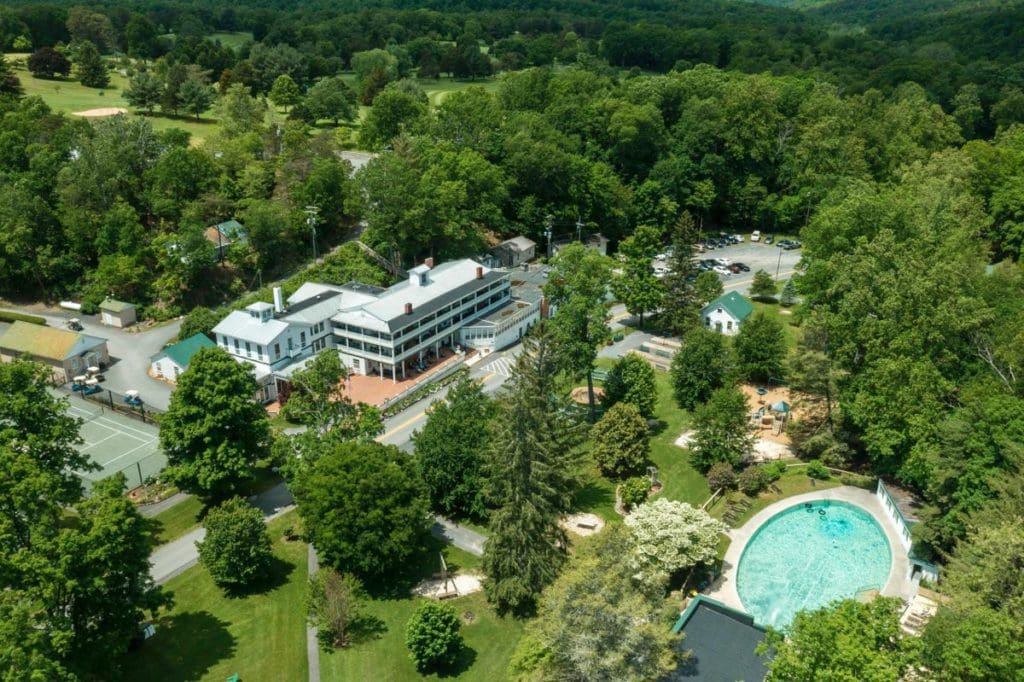 Ariel view of Capon Springs Resort and Spa showing main building and the pool 