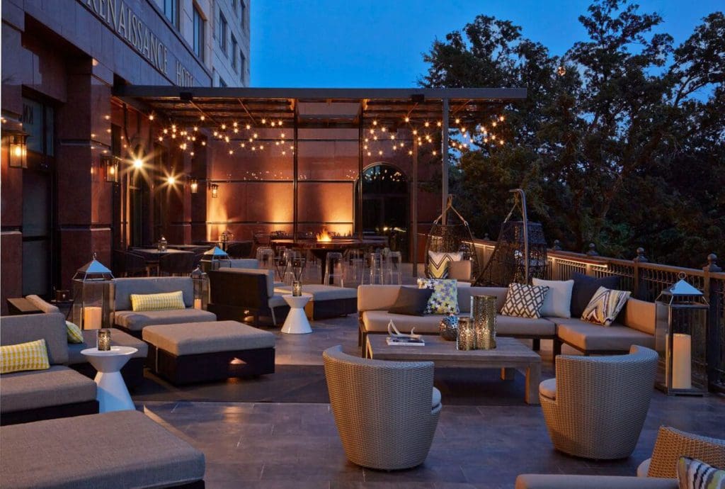 The charming terrace at Renaissance Austin Hotel, all lit up at night.