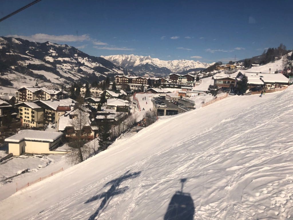 A view of Alpendorf from the gondola, covered in snow.