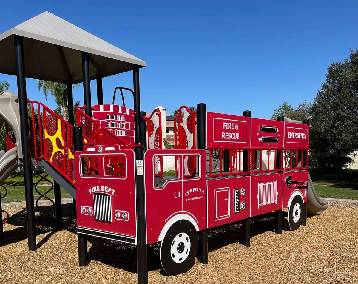 Fire truck-themed play equipment at a playground in Temecula.