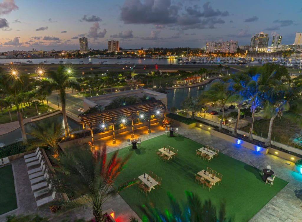 An aerial view of the outdoor space at Sheraton Puerto Rico Hotel & Casino, including several seating options.