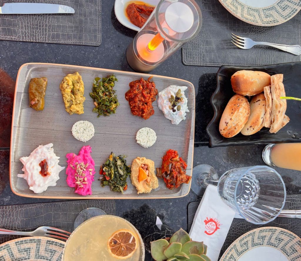 A tabled filled with traditional Turkish foods.