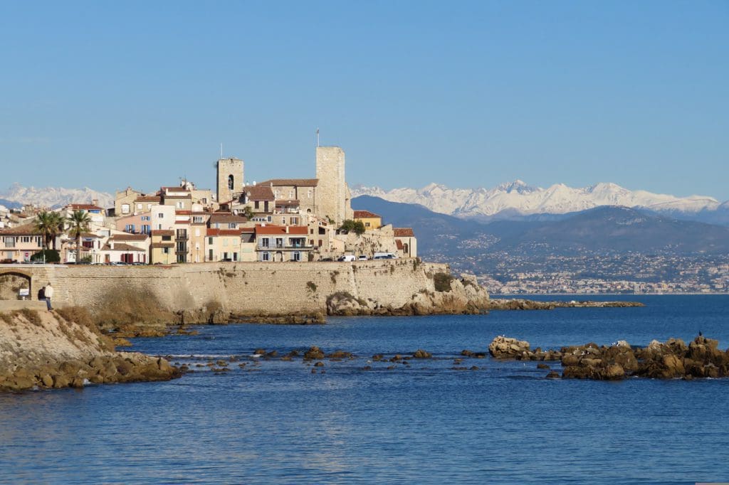 The city of Antibes sits atop a medieval wall facing the ocean.