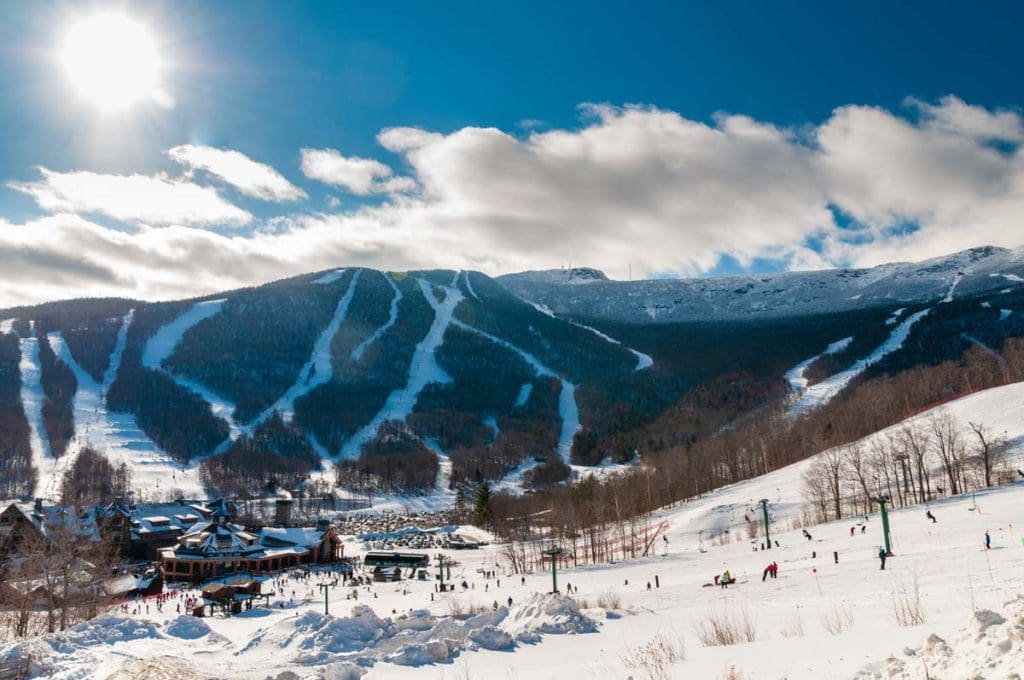 A resort nestled amongst snow and ski runs in the winter in Stowe, one of the best places to go when skiing in Stowe with kids.