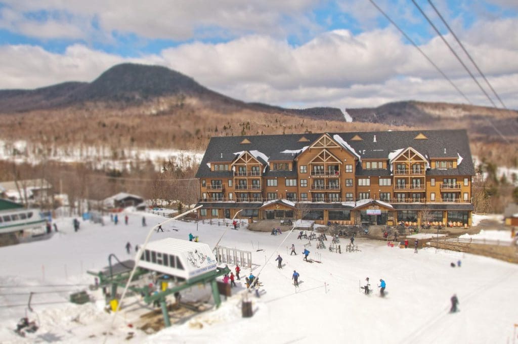 An aerial view of Traum Haus Lodge, one of the best places to stay while skiing at Jay Peak Resort.
