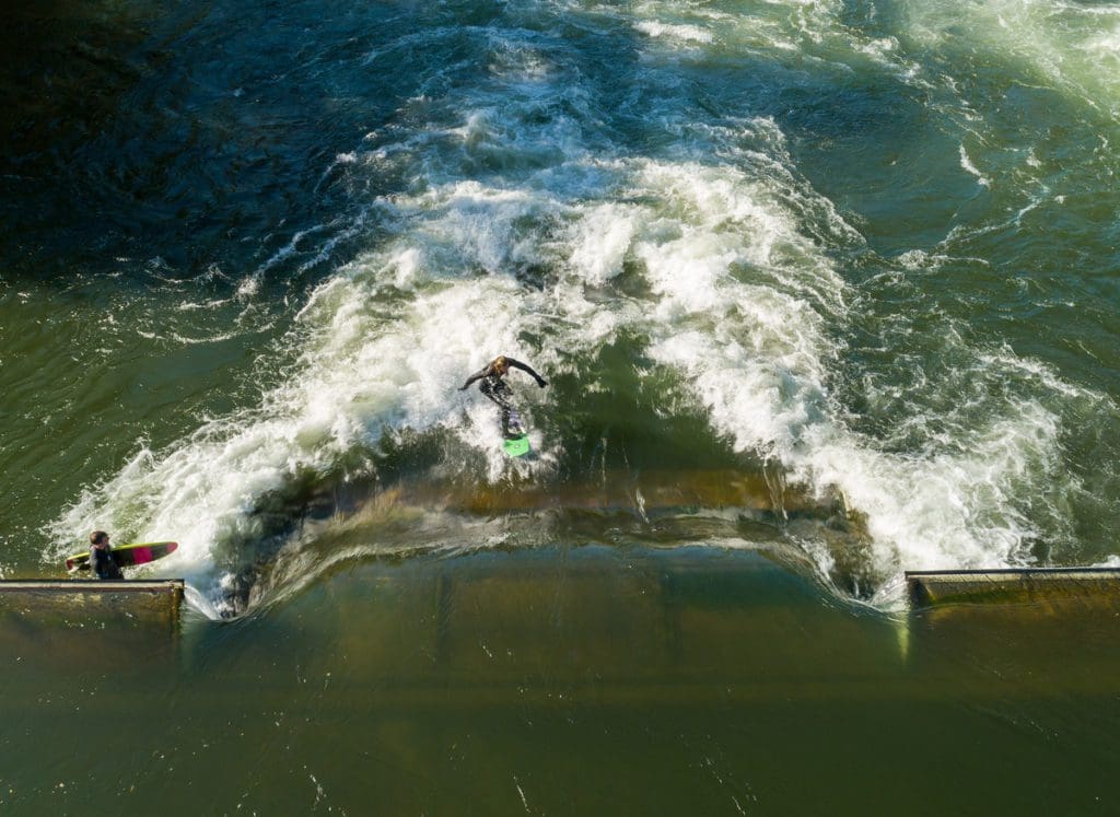 An aerial view of river surfers at the Boise Water Park.