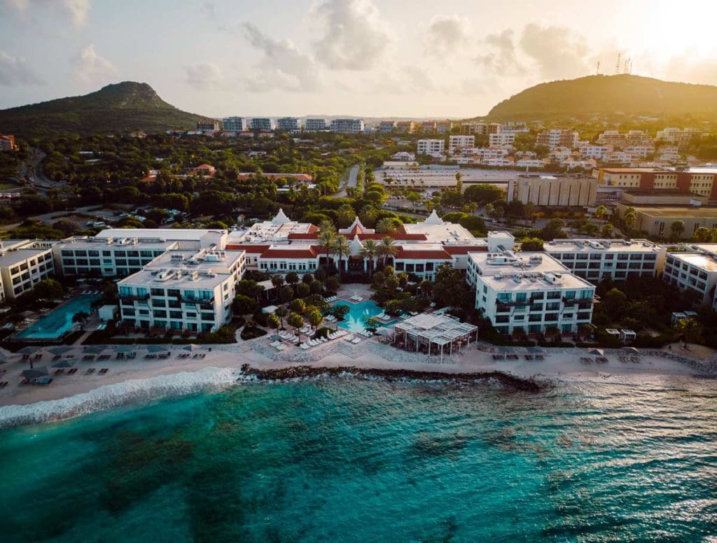 An aerial view of Curaçao Marriott Beach Resort at sunset.