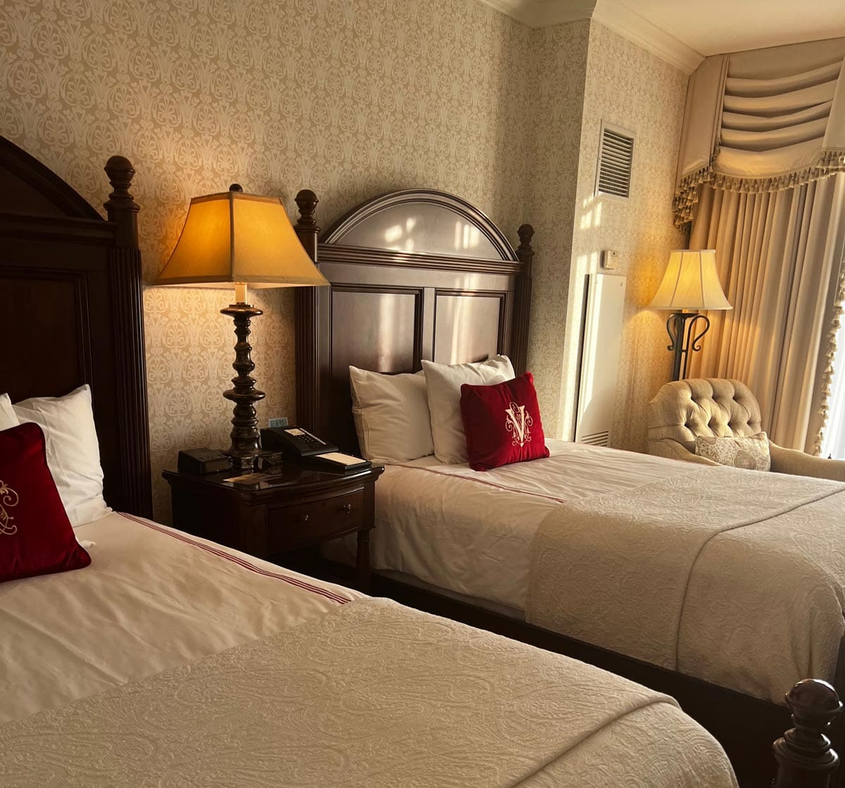 Inside the one of the guest rooms with two double beds at the Inn at Biltmore.