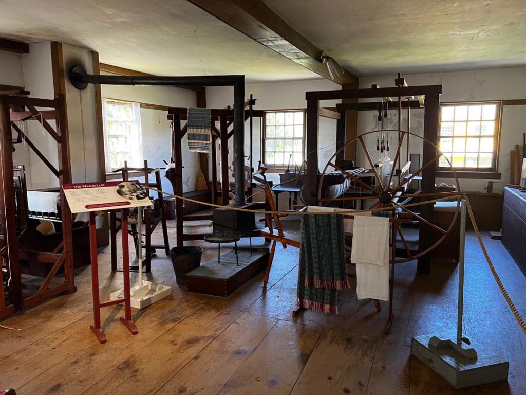 A weaving exhibit and display room at Hancock Shaker Village.