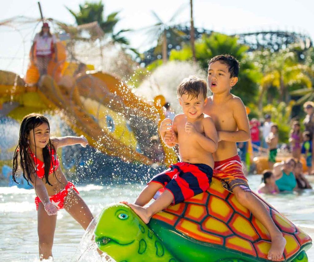 Several kids play at a turtle water feature at Soak City at Kings Dominion, one of the best water parks near Washington DC for families.