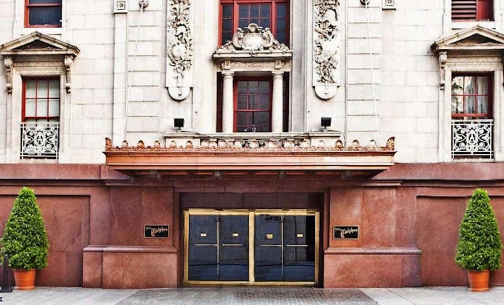 The exterior entrance to the grand The Adolphus, Autograph Collection Hotel, one of the best hotels in Dallas for families.