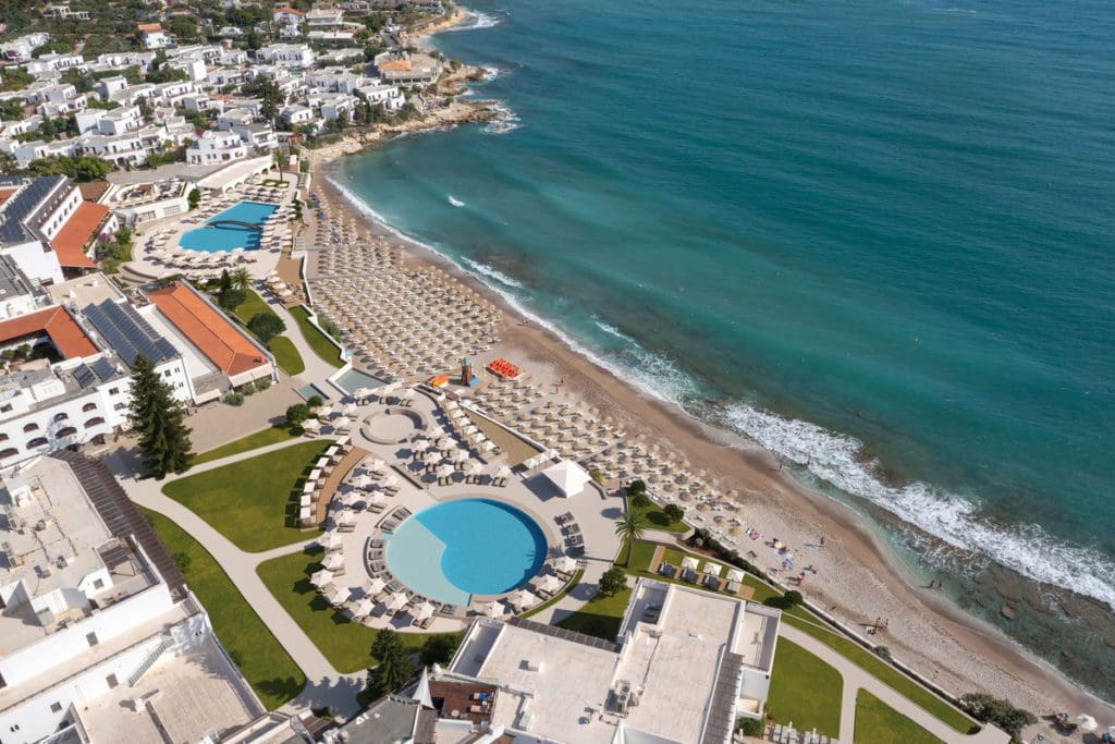 An aerial view of the beach and property of Creta Maris Resort, one of the best all-Inclusive family vacation spots in Europe.