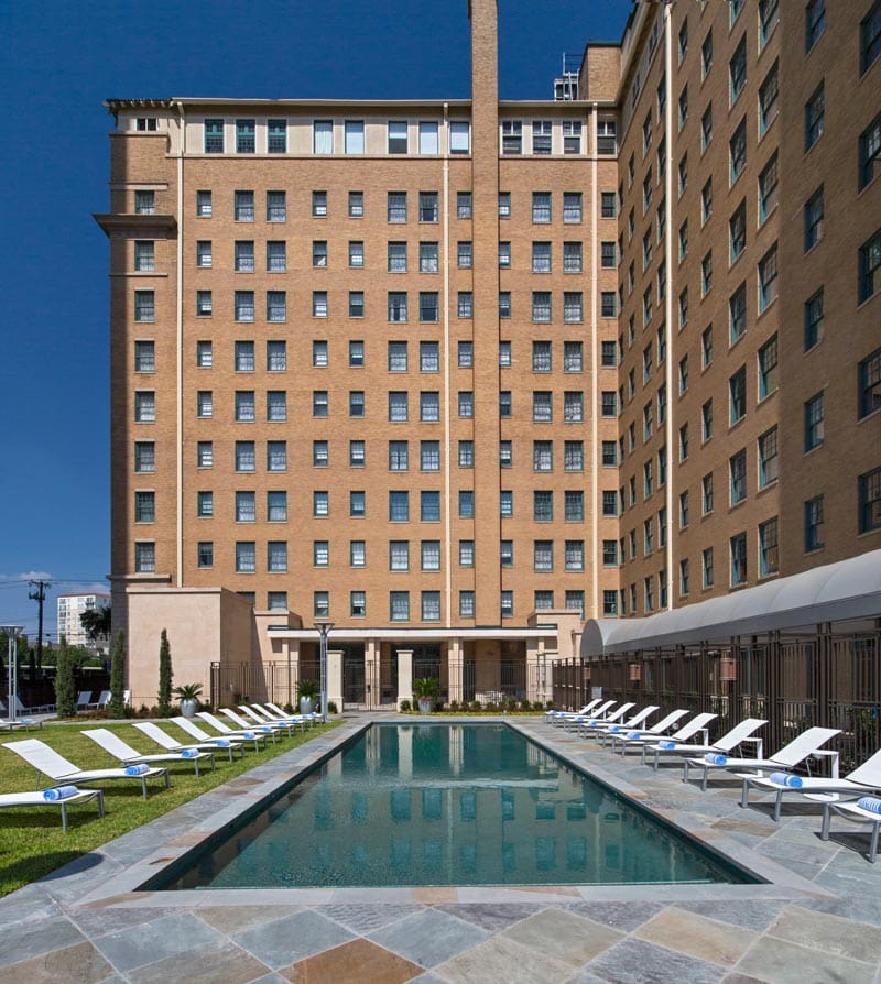 The outdoor pool, tucked into the buildings, of Le Meridien Dallas, The Stoneleigh.