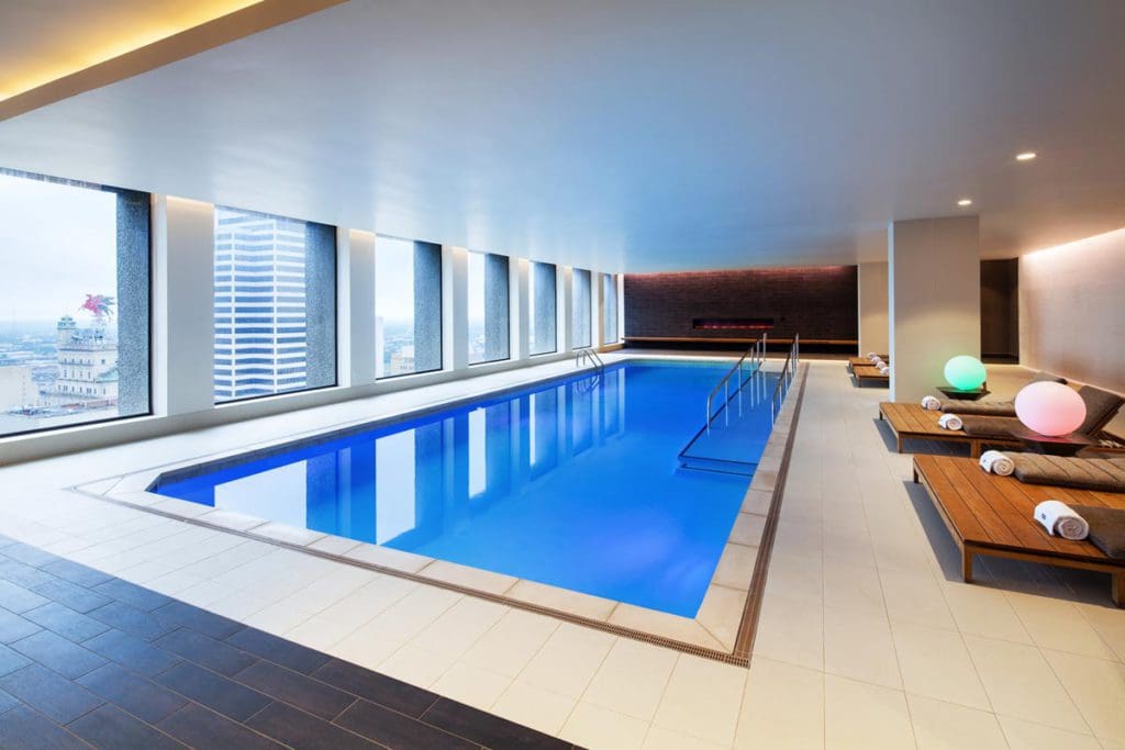 The cozy indoor pool with floor to ceiling windows at The Westin Dallas Downtown.