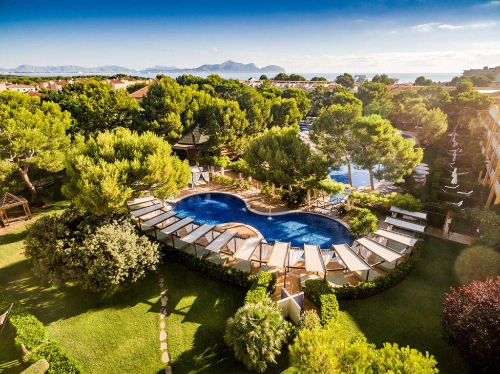 An aerial of the outdoor pool and grounds at Zafiro Mallorca, one of the best all-Inclusive family vacation spots in Europe.