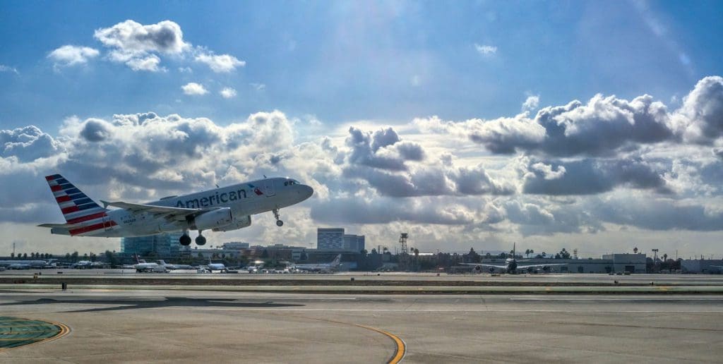 An American Airlines plane takes off at an airport in the United States.