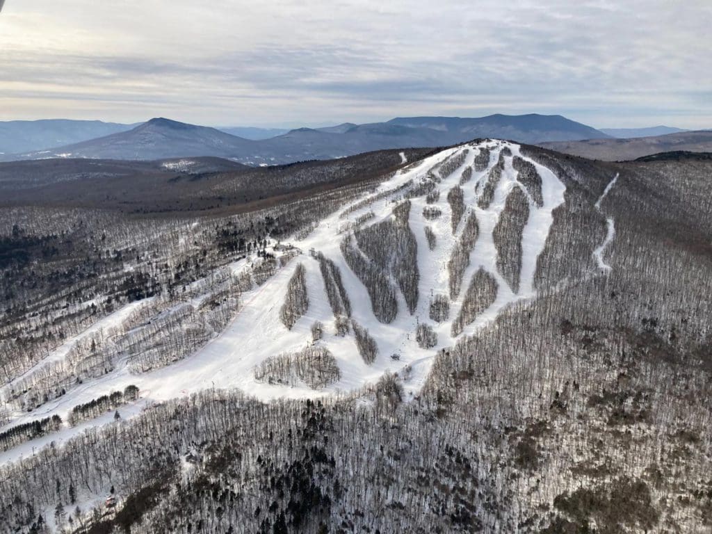 The intimate ski runs at Bromley Mountain Ski Resort, covered in snow.