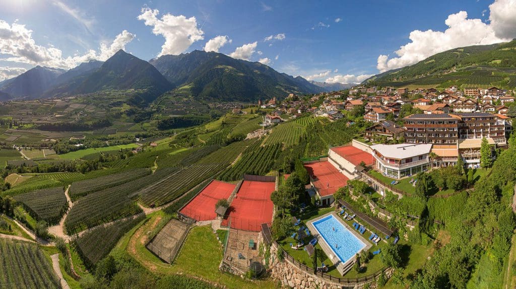 An aerial view of the resort and grounds of Hotel Taushof, one of the best all-inclusive resorts In Italy for kids.