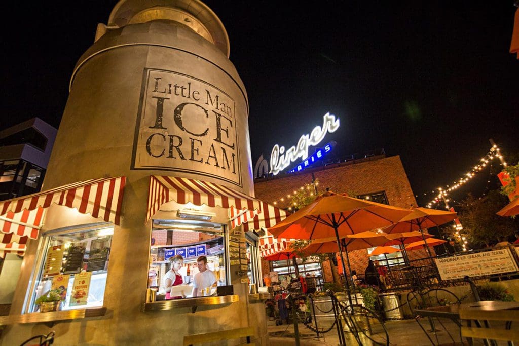 The exterior of Little Man Ice Cream at night.