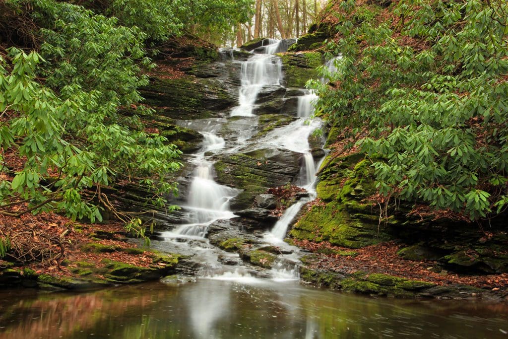A waterfall in the Delaware Water Gap National Recreation Area, located in the Pocono Mountains, one of the best affordable summer vacations in the United States with kids.