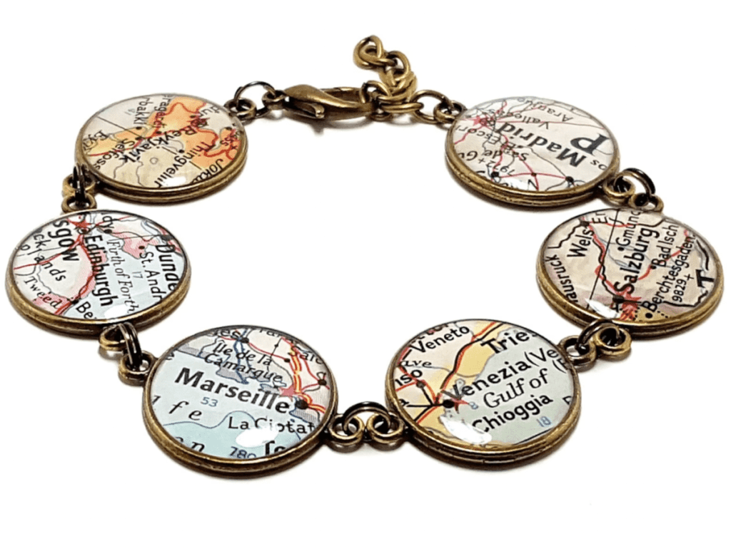 A bracelet depicting map charms, one of the best travel gifts for Mom this Christmas.