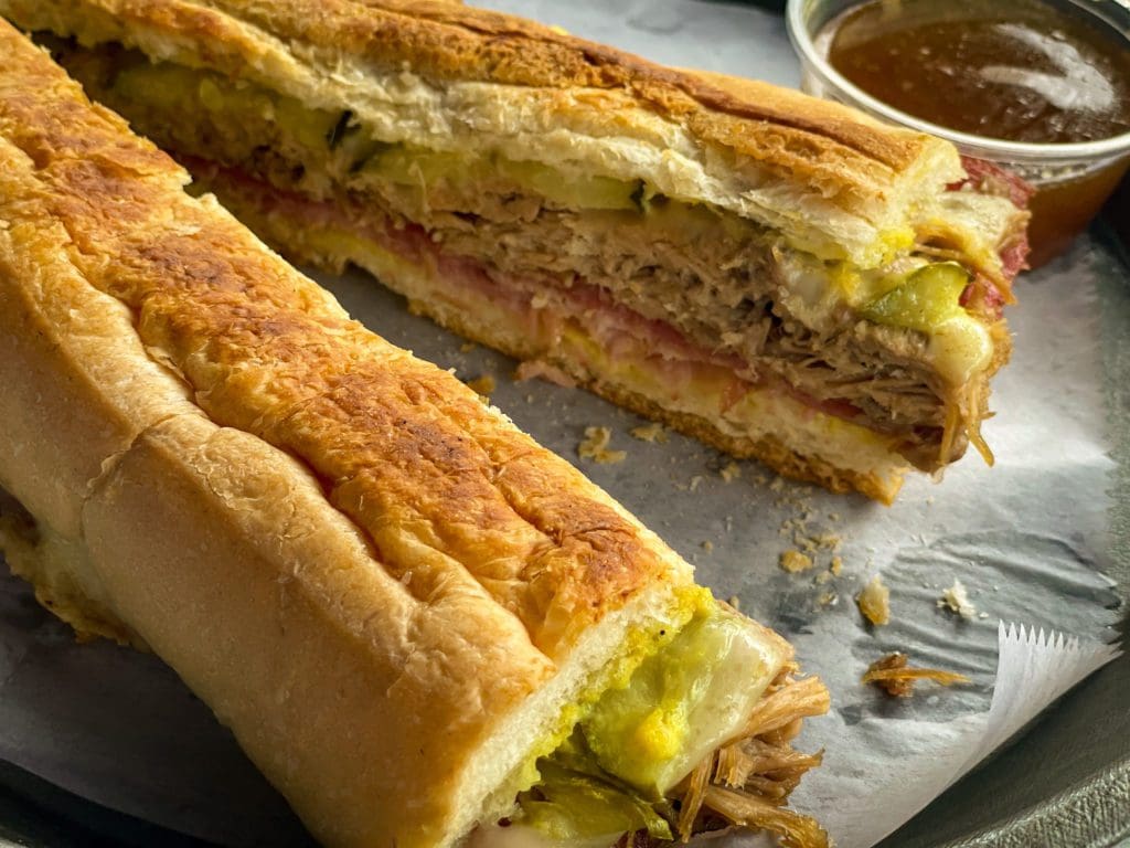 A Cuban sandwich prepared for lunch at The Stone Soup Company in Ybor City, one of the best places to eat in Tampa Bay with kids.