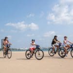 A family of four bikes along the Chicago Lakefront Trail.