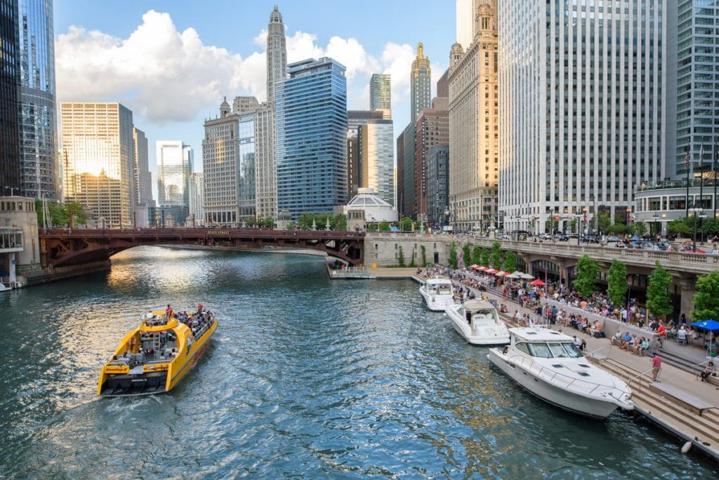 A Chicago Riverboat Architecture Tour boat takes passengers down the river on a tour.