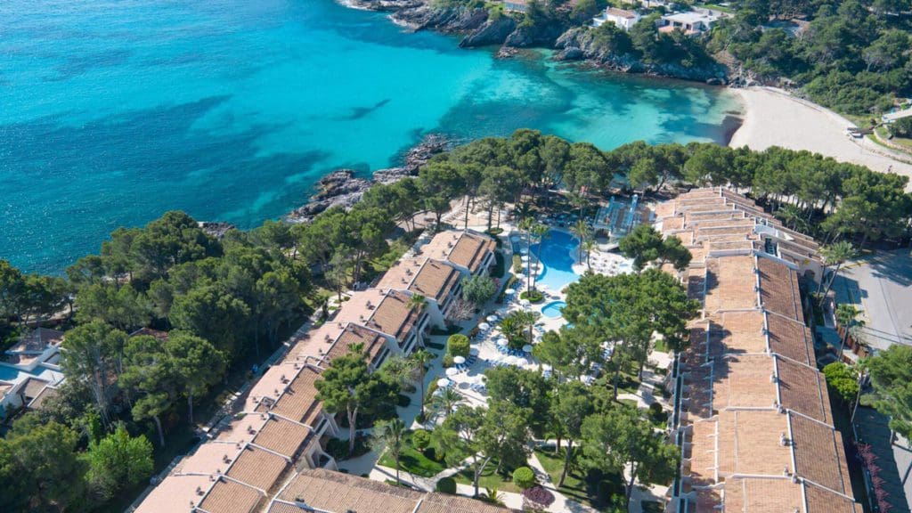 An aerial view of the lovely resort and grounds of Iberostar® Pinos Park, one of the best all-inclusive hotels in Mallorca for families.