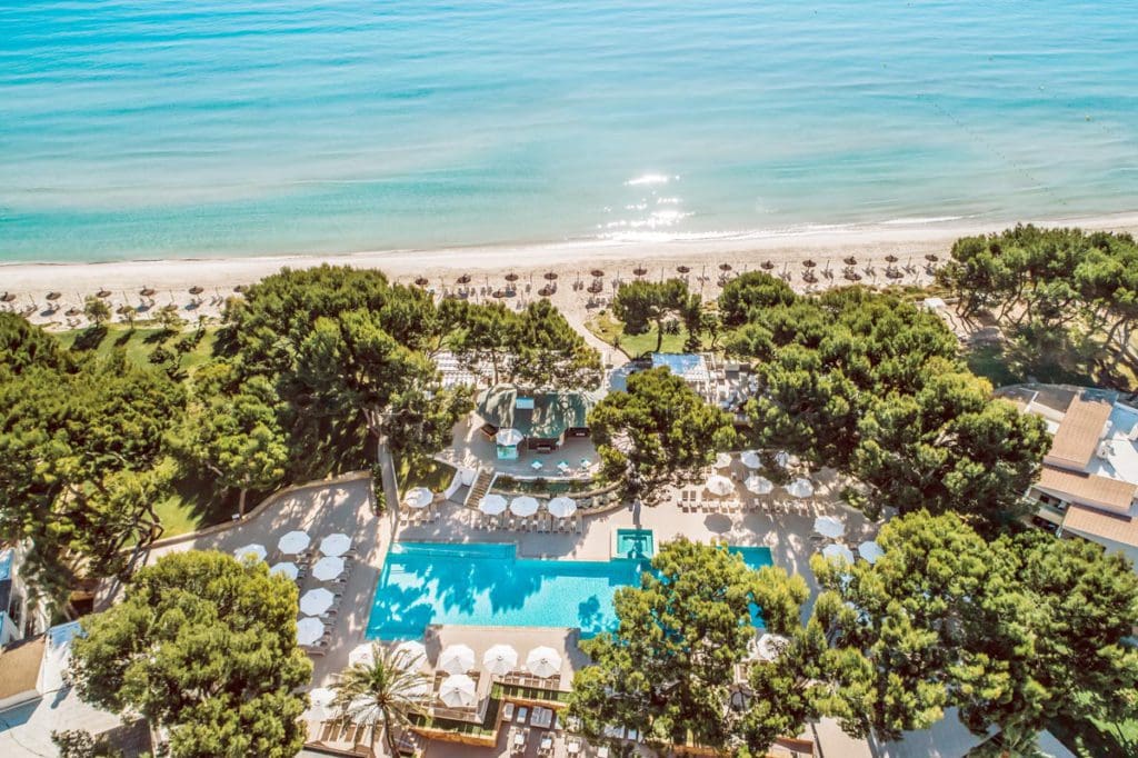 An aerial view of the beachfront property of Iberostar®  Selection Playa de Muro, one of the best all-inclusive hotels in Mallorca for families.