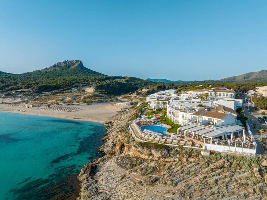 VIVA Cala Mesquida Resort & Spa set about the sea on rocky cliffs.
