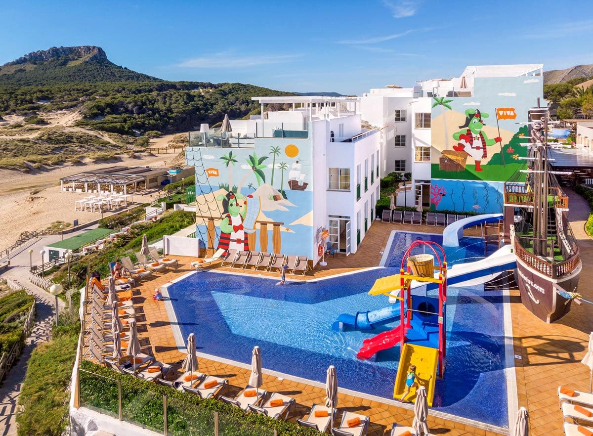 The large, pirate-themed kids' pool and slide area at VIVA Cala Mesquida Resort & Spa.