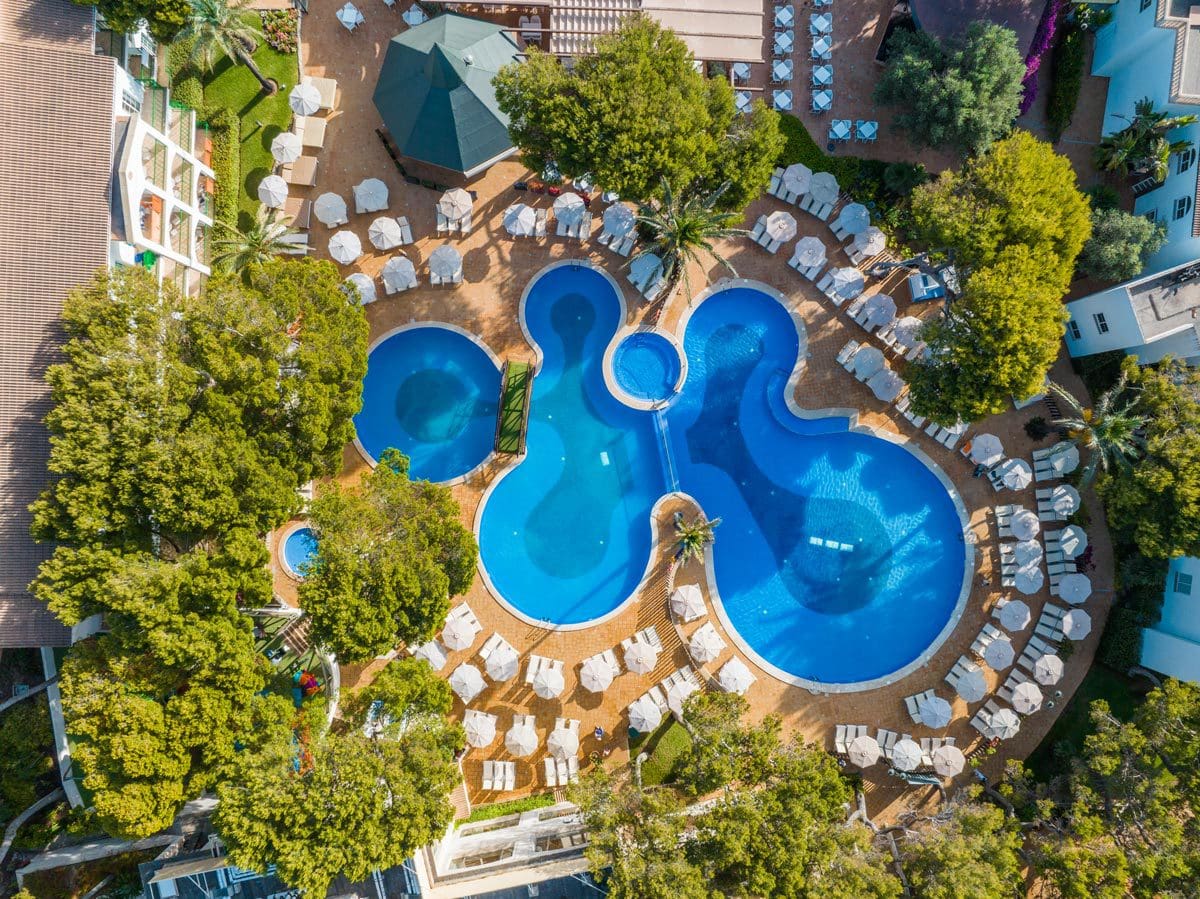 An aerial view of the hotel pool at VIVA Cala Mesquida Resort & Spa.
