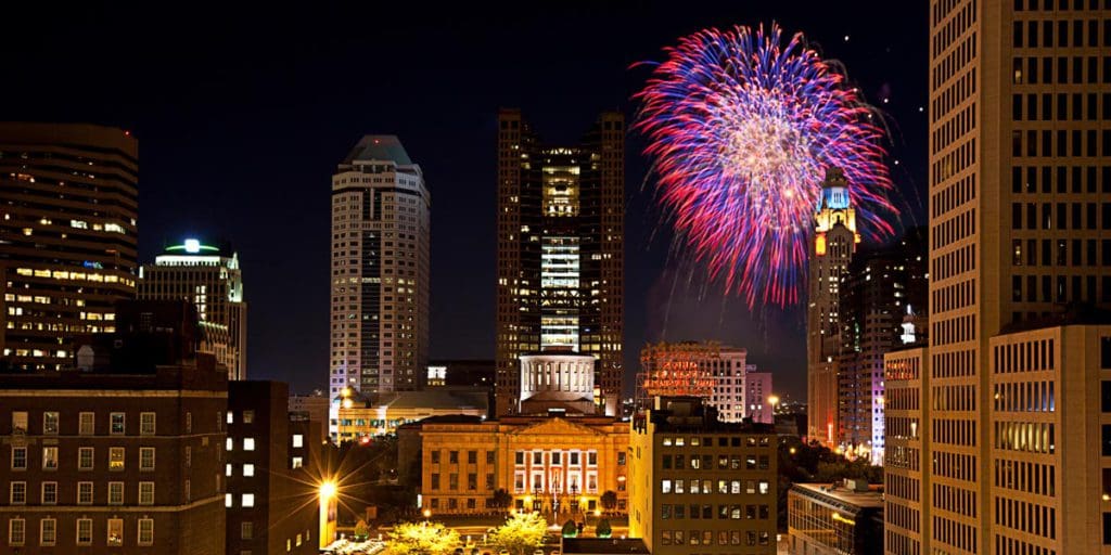 Fireworks over the skyline of Columbus, Ohio, one of the best places to celebrate fourth of July in the US for families.