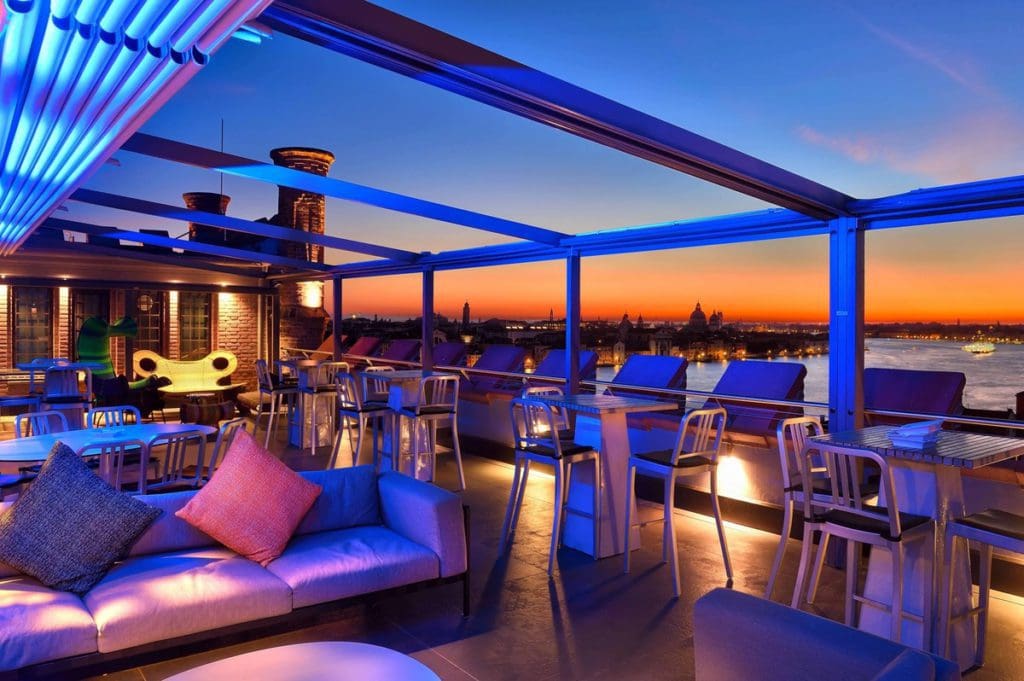 The Skyline Rooftop Bar with view of Venice at Hilton Molino Stucky, one of the best hotels in Venice for families.