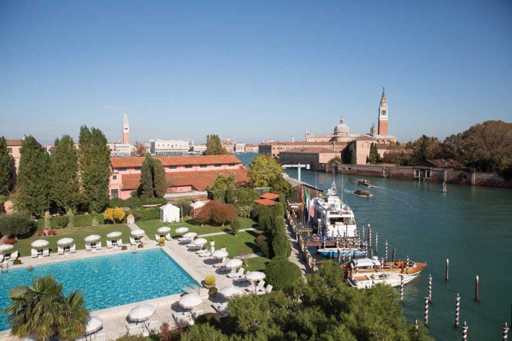 An aerial view of the pool and canal along the property at Hotel Cipriani, A Belmond Hotel, Venice.