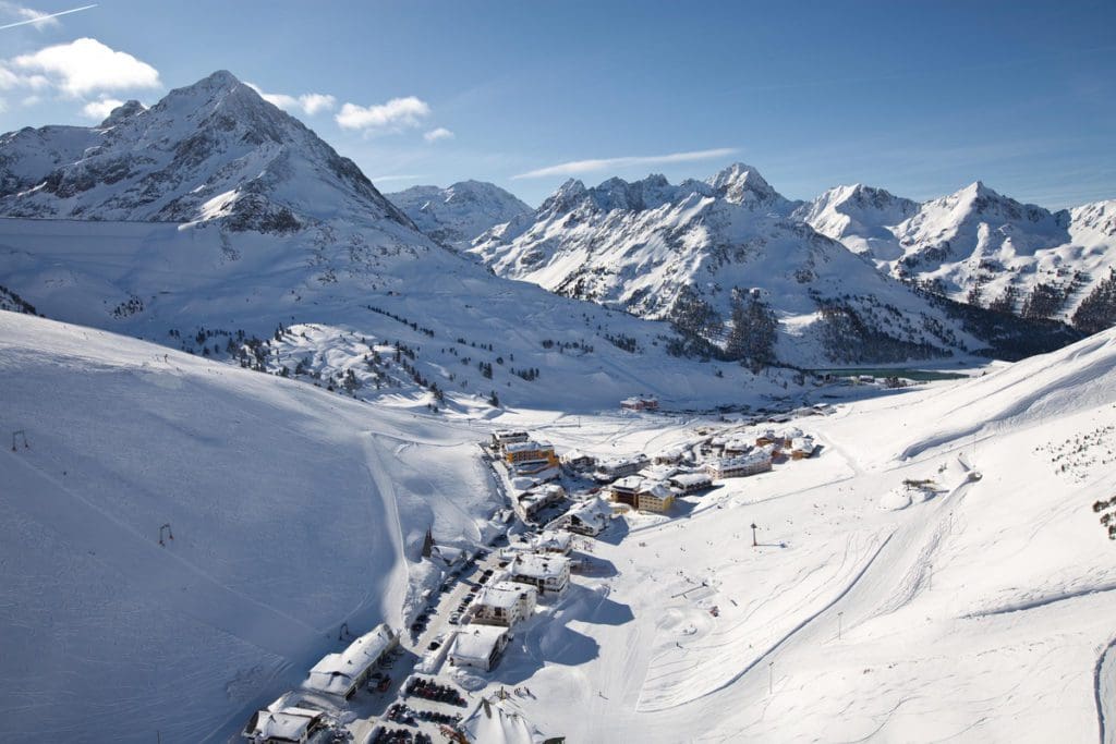 An aerial view of Kühtai, nestled in the snowy mountains of Austria.
