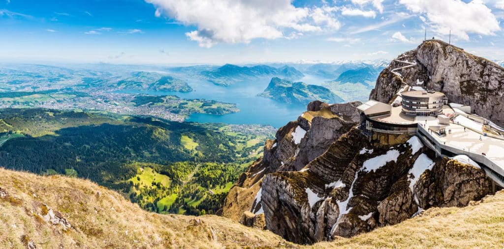 Mount Pilatus overlooking a stunning Swiss valley, a great stop on any Switzerland itinerary with kids.