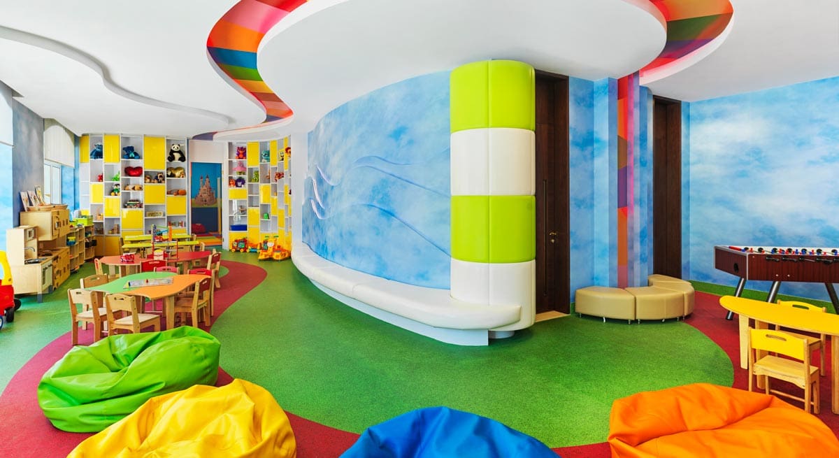 Inside the vibrantly colored kids' club at Raffles The Palm Dubai.