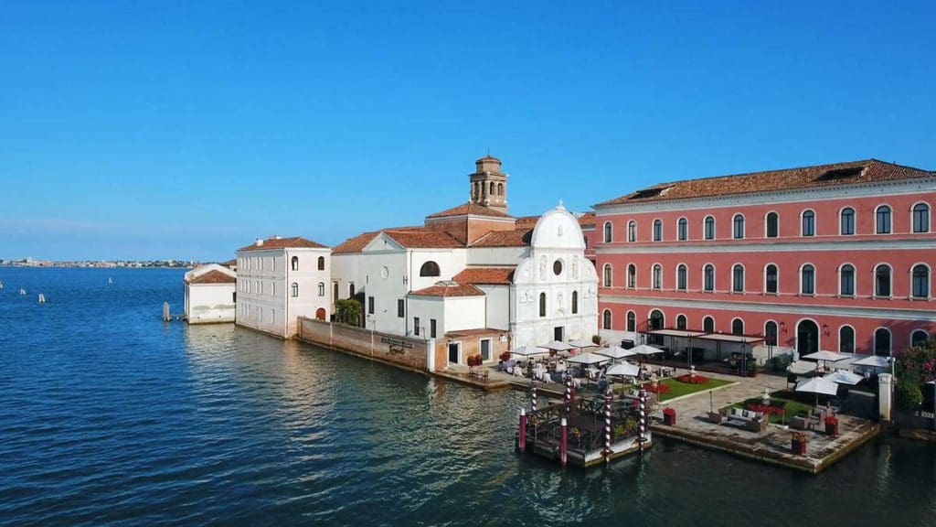 The canal landing and entrance to San Clemente Palace Kempinski Venice, one of the best hotels in Venice for families.