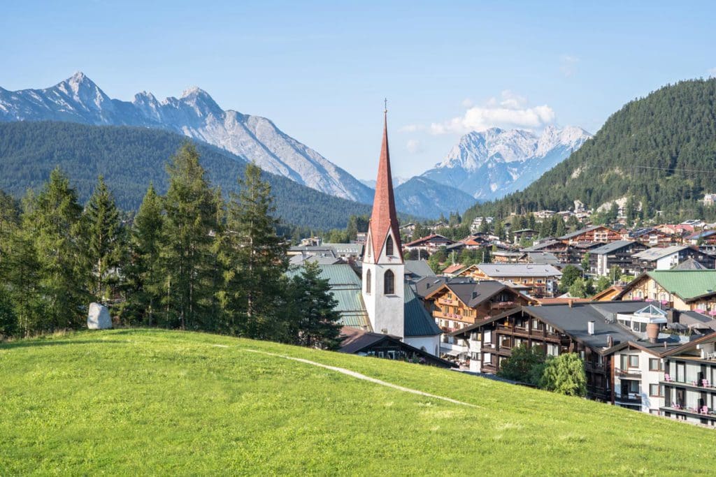 The beautiful town of Seefeld, nestled in the Alps, one of the best destinations in Austria with kids.