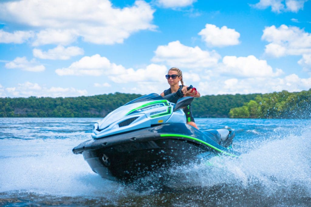 A woman jet skis on Lake of the Ozarks.
