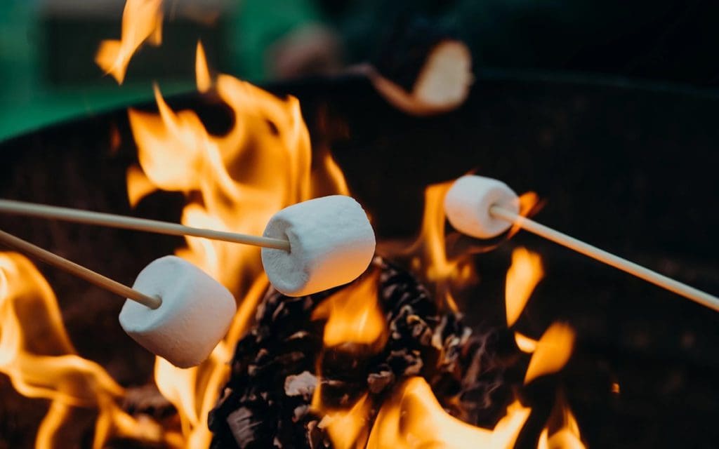 Marshmallows roasting over a bonfire at Junipine Resort.