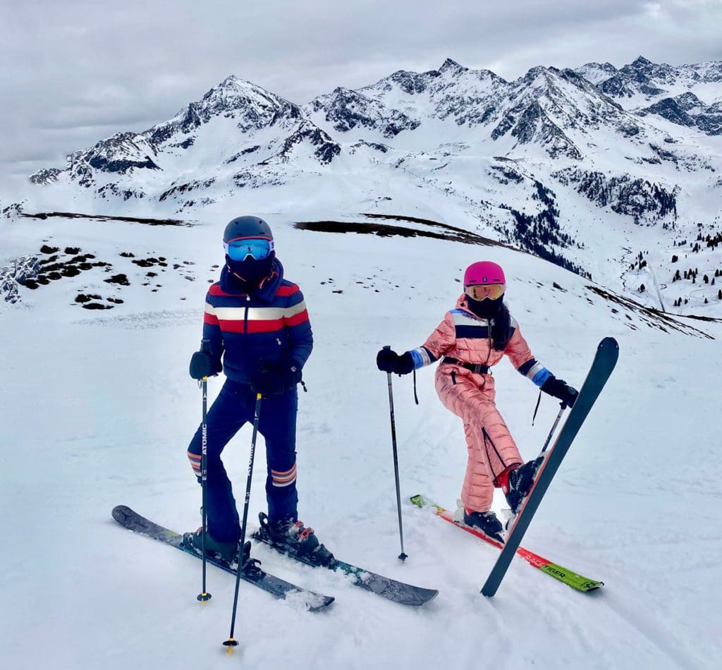 Two kids on skis on the slopes of Kühtai, Austria.
