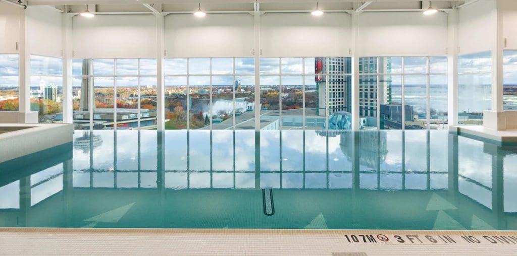 The indoor pool at Hilton Niagara Falls/Fallsview Hotel and Suites, with a view of the falls.