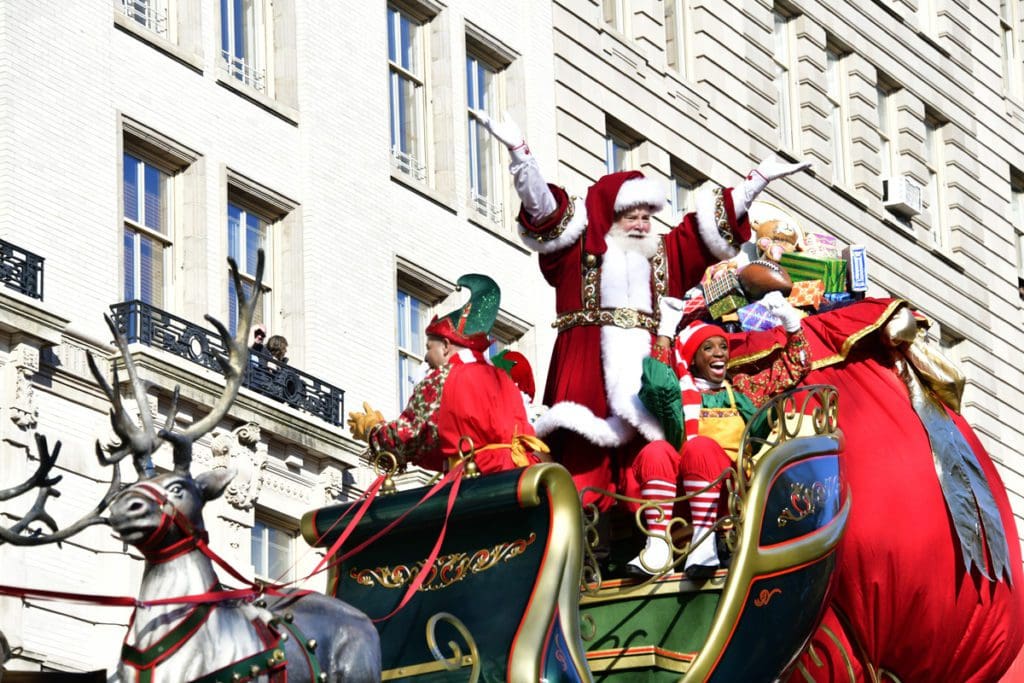 Santa and his Elves on their float in the Macy’s Thanksgiving Day Parade.