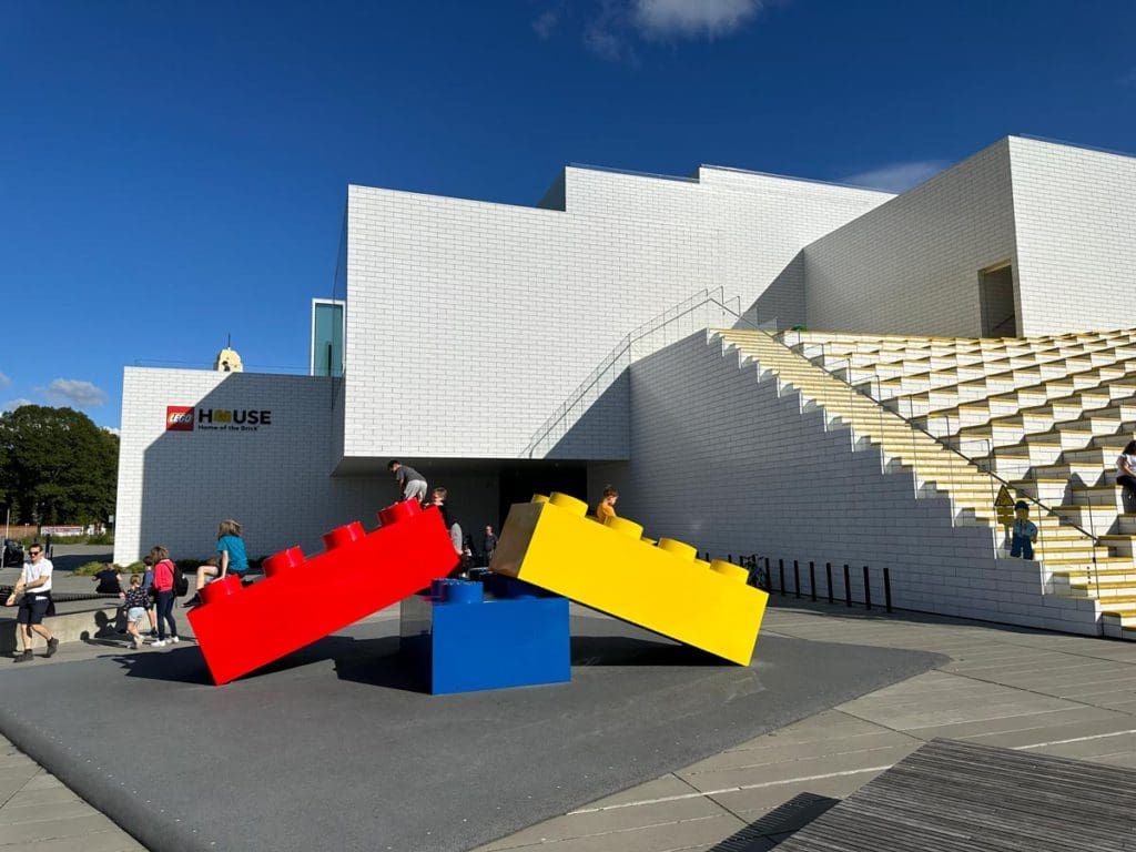 The entrance to a LEGO-themed attraction, with large traditional LEGO out front.
