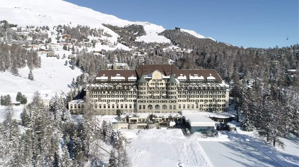 Suvretta House exterior in the winter, one of the best hotels in St. Moritz for families.