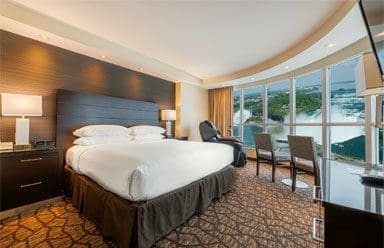 A king room, with a view of the falls, at Embassy Suites by Hilton Niagara Falls Fallsview.