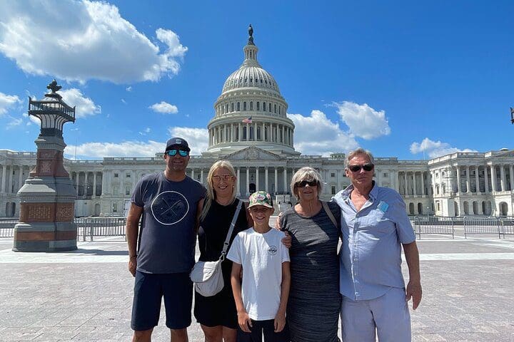 A family stands in front of the US Capitol Building on the Best Customized and Private Guided Tours of Washington, DC.
